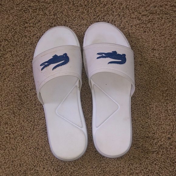 Lacoste Shoes - Lacoste blue and white slip on sandals
